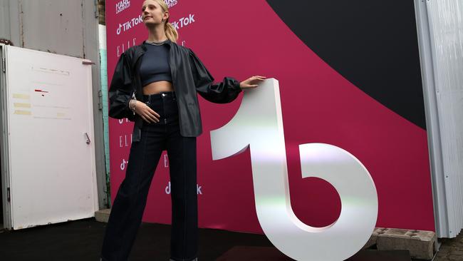 Model Trixi Giese poses with the logo of the short-form video hosting service TikTok at an event called "The Future of Fashion" on July 06, 2022 in Berlin, Germany. Picture: Adam Berry/Getty Images