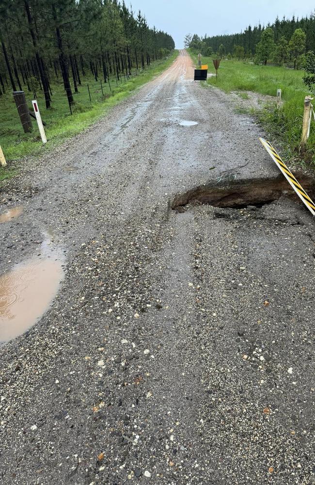 Flash flooding, lightning strikes and trees down are just some of the carnage left behind in the wake of a day of severe storms across Queensland. Counter Rd in Wolvi. Picture: Holly Van Slooten