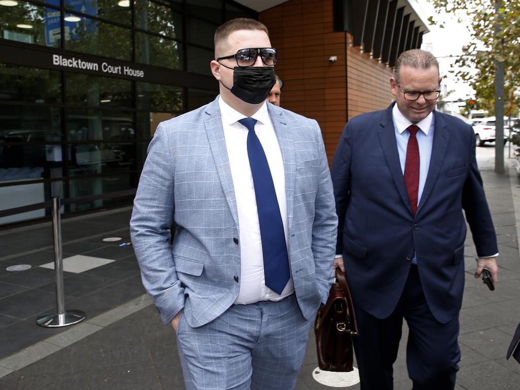 NSW Police Constable James Potloka leaves Blacktown Local Court after his sentencing on Thursday, with his barrister Tim Lowe. Picture: NewsWire / John Appleyard