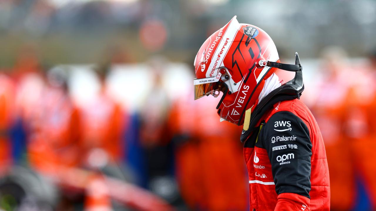 NORTHAMPTON, ENGLAND - JULY 03: Fourth placed Charles Leclerc of Monaco and Ferrari looks dejected in parc ferme during the F1 Grand Prix of Great Britain at Silverstone on July 03, 2022 in Northampton, England. (Photo by Mark Thompson/Getty Images)