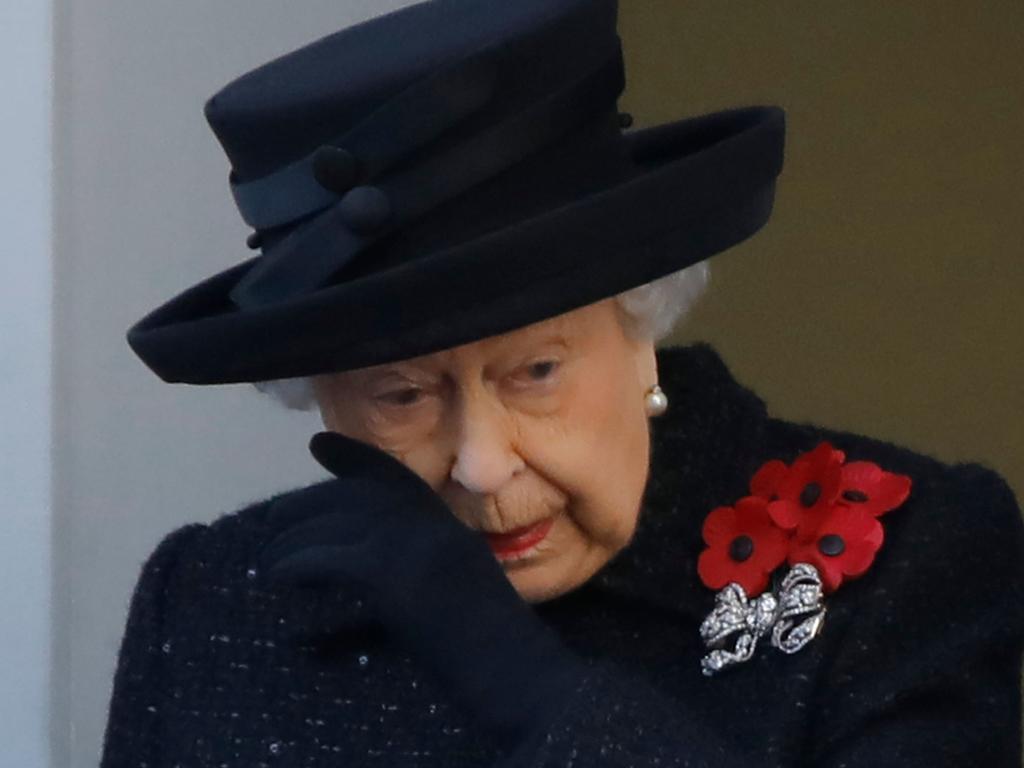 The Queen wiping away a tear during 2019’s Remembrance Day ceremony. Picture: Tolga Akmen/AFP