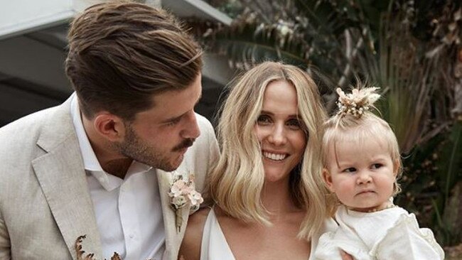 Western Bulldogs forward Josh Bruce and his wife Pip, pictured with daughter Poppy, were among the high-profile couples to marry at Byron Bay in 2019. However, the wedding hotspot is fast being overtaken by Sydney suburbs due to the pandemic.