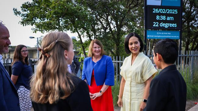 Parramatta MP Donna Davis and Education Minister Prue Car talk to Newington Public School students on Monday.