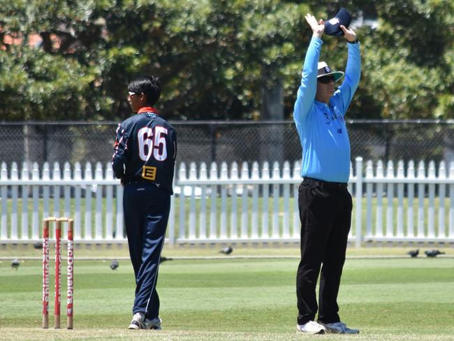 Umpire signals a six to bring up Lachlan Coy's half century. Picture: Sean Teuma