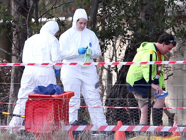 Workers at the Meredith Chicken Farm go through a cleaning station before entering the farm. Picture: Mike Dugdale