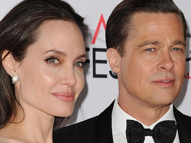 HOLLYWOOD, CA - NOVEMBER 05:  Angelina Jolie and Brad Pitt attend the premiere of "By the Sea" at the 2015 AFI Fest at TCL Chinese 6 Theatres on November 5, 2015 in Hollywood, California.  (Photo by Jason LaVeris/FilmMagic)