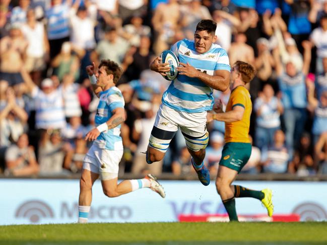 Argentina's Joaquin Oviedo dives to score a try in Santa Fe. Picture: GERONIMO URANGA / AFP