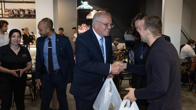 ScoMo stocks up on Lebanese sweets at Abla’s Pastries at Granville. Picture: Jason Edwards