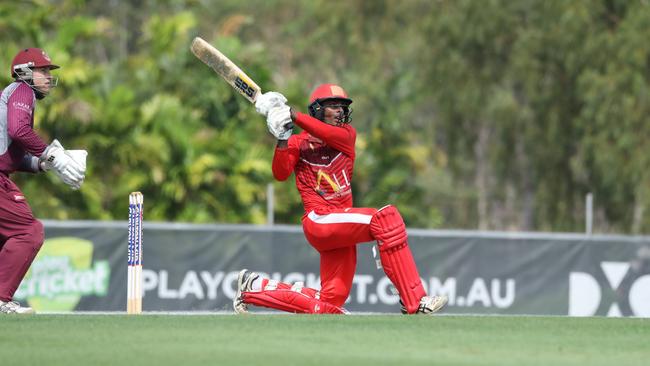 Waratah's Ashley Chandrasinghe slog sweeps for four. Picture: Roz Lavercombe