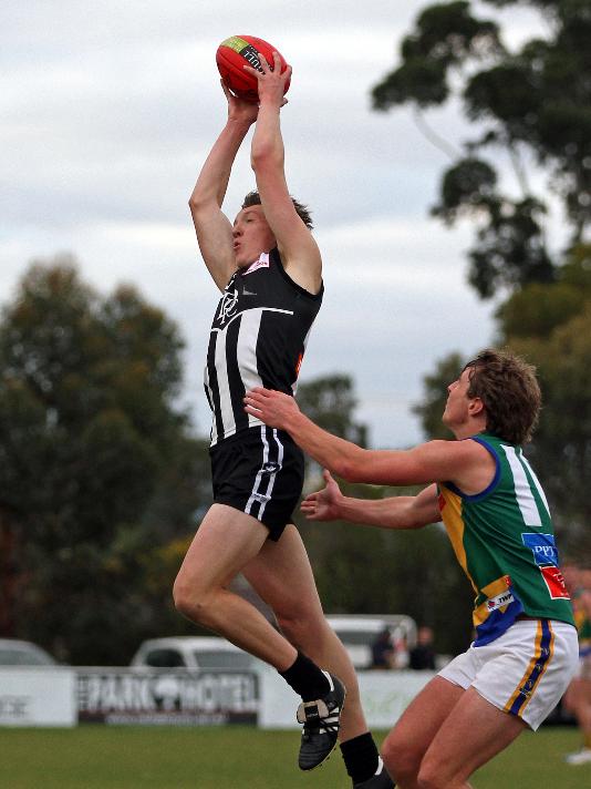 Luke Delahey rises to mark for Darley. Picture: Aaron Cook