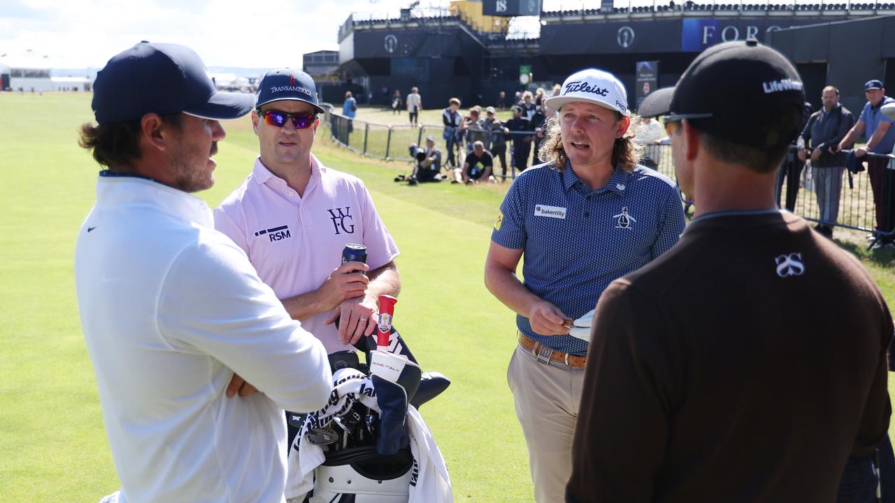 Smith with Brooks Koepka, who has won five majors. Picture: Gregory Shamus/Getty Images