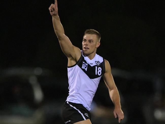 Jay Foon celebrates kicking a VFL goal for Southport and Geelong at Fankhauser Reserve. (Photo by Kris Pardoe-Matthews/KPM Sports Images)