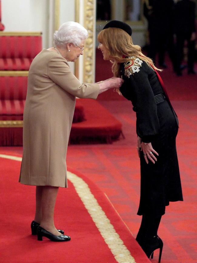 Charlotte Tilbury receives her MBE for services to the beauty and cosmetics industry from Queen Elizabeth II in 2018. Picture: Courtesy of Charlotte Tilbury