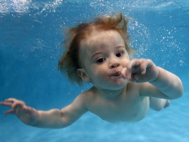 SUN4MON - Duck and Dive swim school in Artarmon teaches babies to swim. Sebastian Tait 1 learns to swim. Picture: Toby Zerna