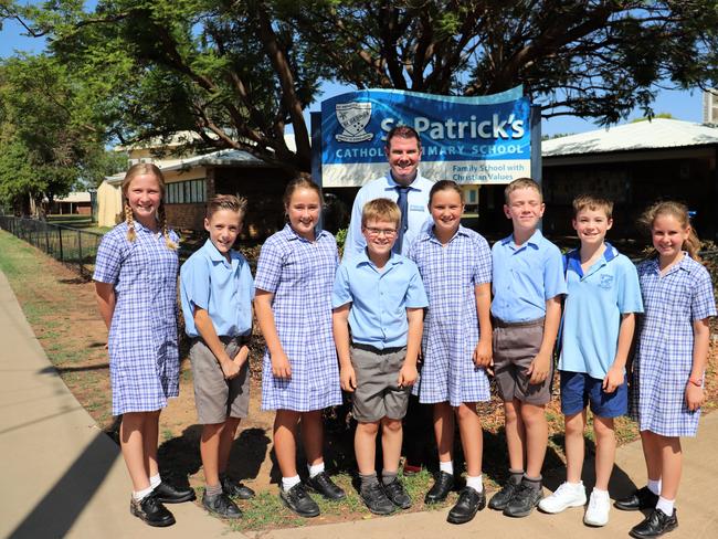 St Patrick's School principal Brendan Redinger with school captians Emma Blanch and Ollie Lockwood, and students Shelley Easton, Will McKay, Olivia Haynes, Tom Bowman, Daniel Sheedy, and Annabelle Suttor.