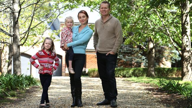 Etta and Ben Hurst, 39 and 44, with daughters Rose, 6, and Georgia, 3, who are selling their home at Burradoo in the NSW southern highlands. Picture: Britta Campion