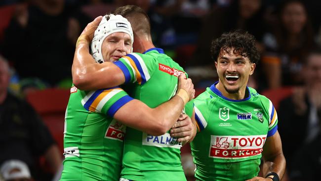 Jarrod Croker (L) celebrates with team mates. (Photo by Chris Hyde/Getty Images)