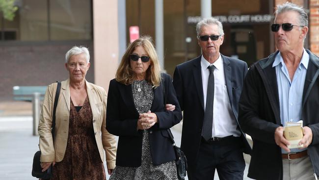 Davidson’s parents, centre, with supporters at court. Picture: David Swift