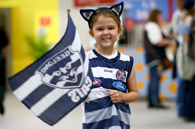 BRISBANE, AUSTRALIA - OCTOBER 24: A young Cats fan poses before the 2020 AFL Grand Final match between the Richmond Tigers and the Geelong Cats at The Gabba on October 24, 2020 in Brisbane, Australia. (Photo by Jono Searle/AFL Photos/via Getty Images)