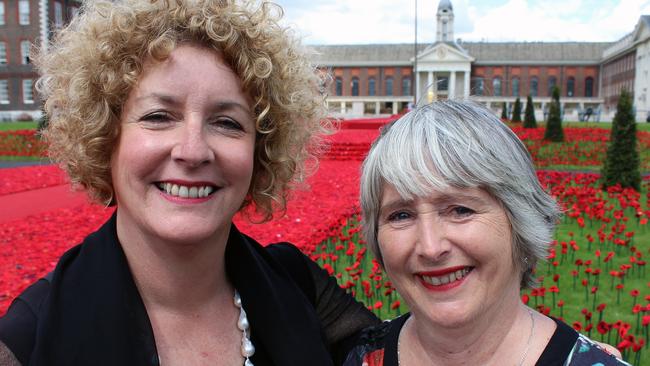 Lynn Berry and Margaret Knight in front of their stunning poppy display. Picture: AAP/ Image/Lloyd Jones.