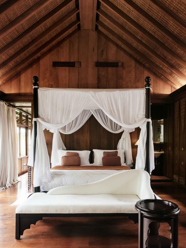 Many of the suites are fitted with Indonesian antiques andfour-poster beds. Picture: Elise Hassey