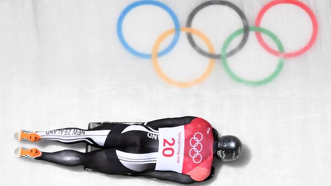 New Zealand's Rhys Thornbury competes in heat three of the men’s skeleton. Photo: AFP