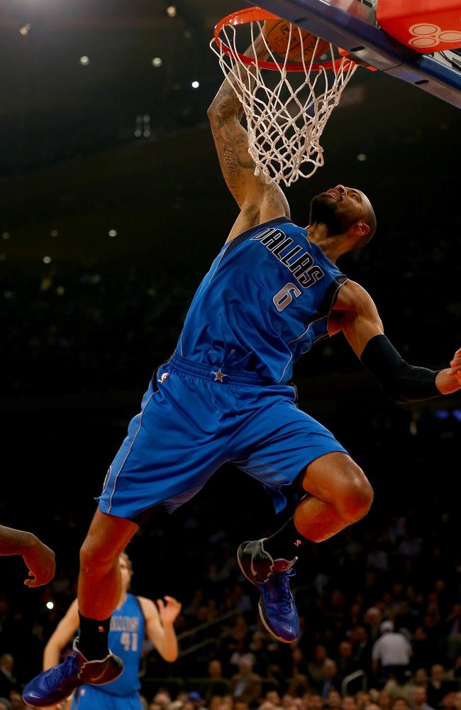 Tyson Chandler throws down a big dunk for Dallas against New York.