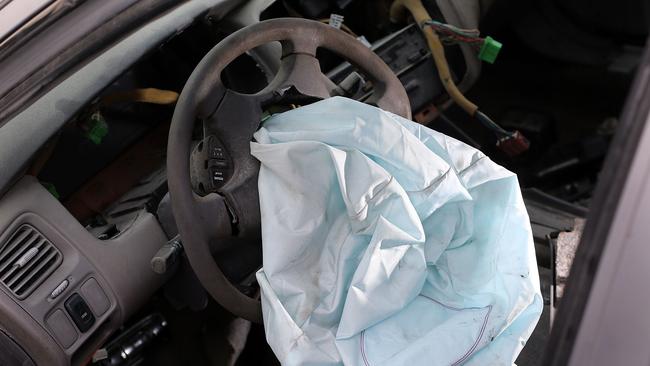 MEDLEY, FL - MAY 22:  A deployed airbag is seen in a 2001 Honda Accord at the LKQ Pick Your Part salvage yard on May 22, 2015 in Medley, Florida. The largest automotive recall in history centers around the defective Takata Corp. air bags that are found in millions of vehicles that are manufactured by BMW, Chrysler, Daimler Trucks, Ford, General Motors, Honda, Mazda, Mitsubishi, Nissan, Subaru and Toyota.  (Photo by Joe Raedle/Getty Images)