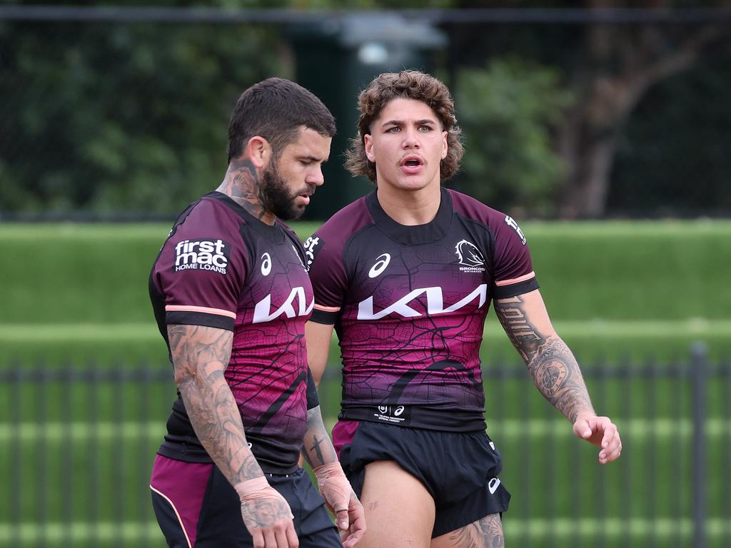 Reece Walsh (R) chats to halfback Adam Reynolds at training. Picture: Liam Kidston