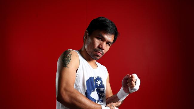 MANILA, PHILIPPINES — MAY 19: Manny Pacquiao warps his hands before a training session at the Elorde boxing Gym on May 19, 2017 in Manila, Philippines. (Photo by Chris Hyde/Getty Images)