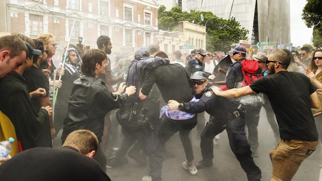 Police clash with protesters during the 2017 rally. Picture: Justin Lloyd