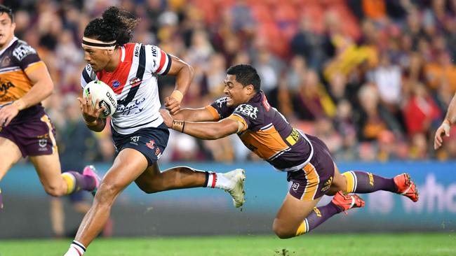 Sitili Tupouniua attempts to break away from Anthony Milford. Picture: AAP Image/Darren England