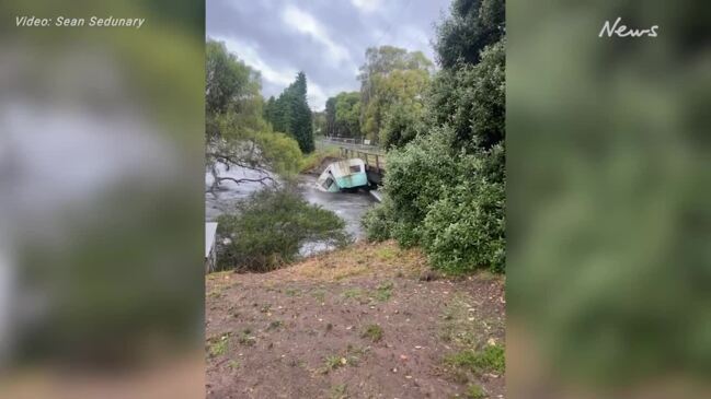 Caravan sucked under Currency Creek bridge in floodwaters