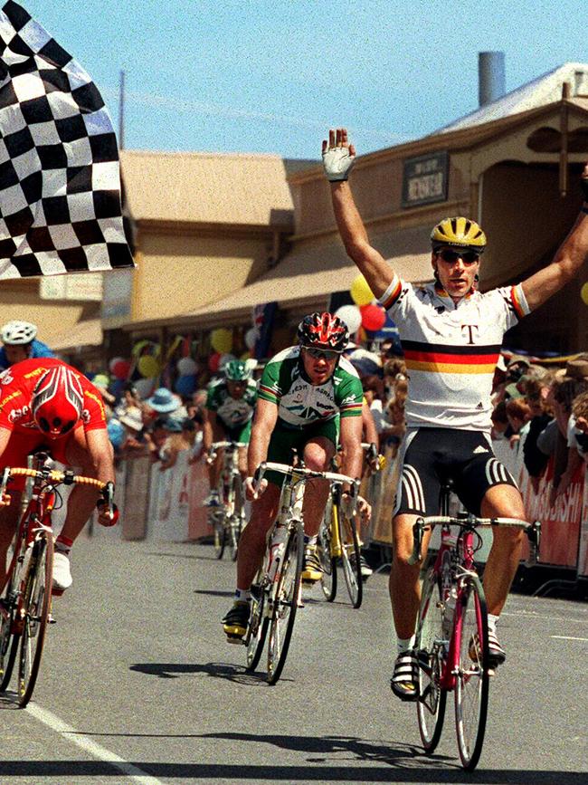 German cyclist Erik Zabel crossing finish line after winning second stage of Tour Down Under in 1999.