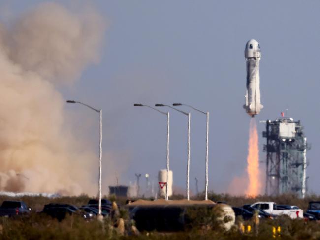 Blue Origin’s New Shepard lifts-off from the launch pad carrying 90-year-old Star Trek actor William Shatner and Australian Chris Boshuizen. Picture: Getty Images/AFP