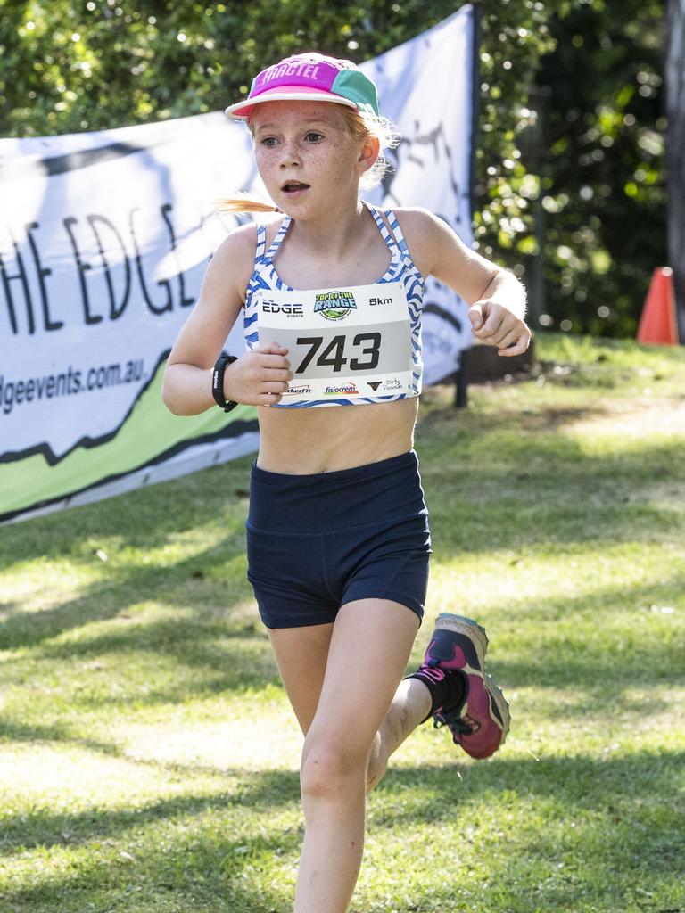 Violet Richardson 9yo wins the 5km event outright. Top of the Range adventure trail run at Picnic Point. Sunday, April 2, 2023. Picture: Nev Madsen.