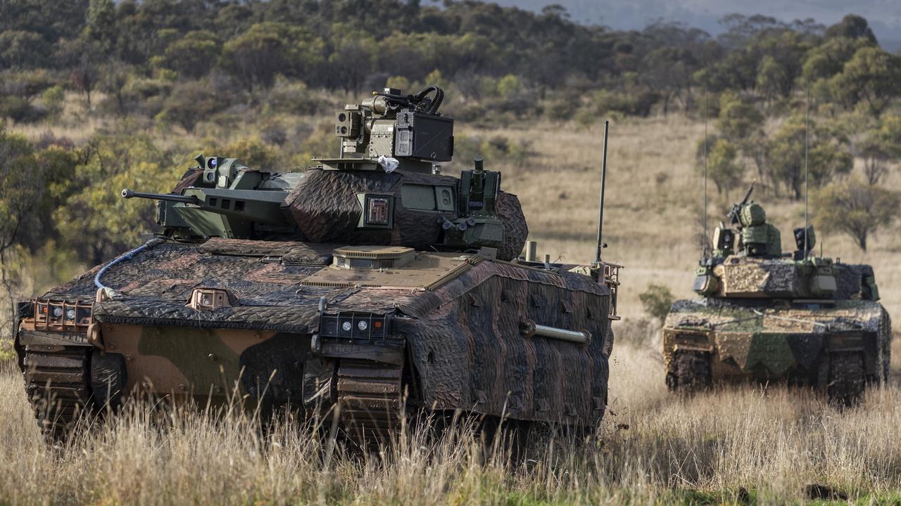 Hanwha Defense Australia Redback Infantry Fighting Vehicle (front) and Rheinmetall Defence Australia LYNX KF41 Infantry Fighting Vehicle (back), conduct evaluation trials at Puckapunyal Military Area, Victoria.