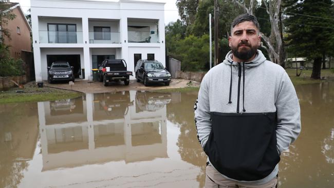 Just three months after moving his young family into his Lansvale home, Yousef Dirgham is left surveying the damage – including two ruined vehicles and thousands of dollars of damage to his tools. Picture: David Swift