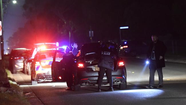 Police at the scene of the party fatality on Friday night. Picture: Gordon McComiskie