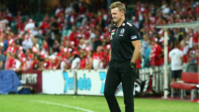 SYDNEY, AUSTRALIA - MARCH 26: Magpies coach Nathan Buckley enters the field following his teams loss during the round one AFL match between the Sydney Swans and the Collingwood Magpies at Sydney Cricket Ground on March 26, 2016 in Sydney, Australia. (Photo by Cameron Spencer/Getty Images)