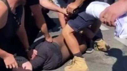 The alleged driver, Gulet Ahmed, was restrained by bystanders before police arrived. Picture: 9NEWS