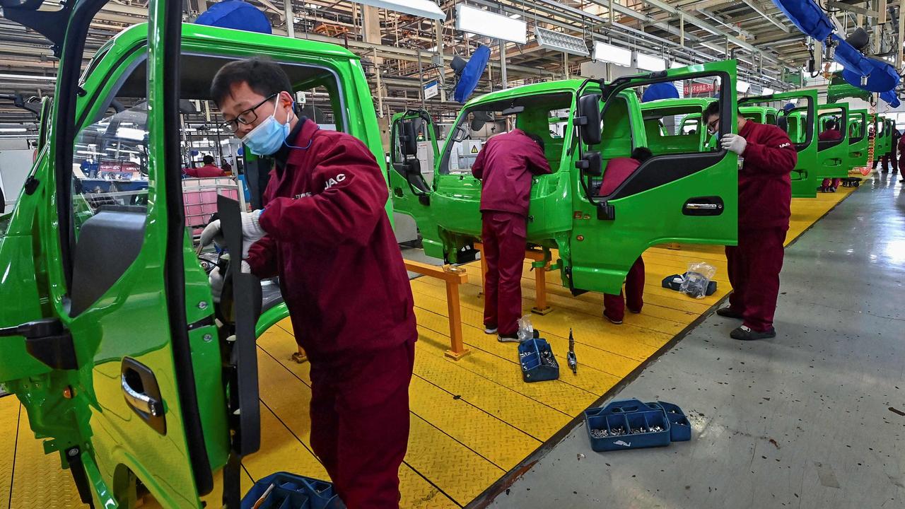 Multinationals may reassess the level of risk of manufacturing in China. Picture: AFP/China OUT