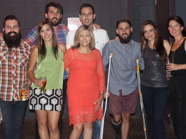 Emanuela Cioffi, centre, and her family, from left: son Nicholas, daughter Michelle, son Christian, son Daniel, Michelle’s husband Steve, Daniel’s wife Yolanda, Christian’s partner Jess. Picture: Supplied by family