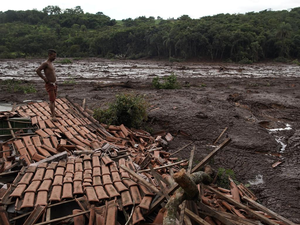 Millions of tons of muddy sludge was spewed across the facility and down towards farmland alongside the nearby town of Brumadinho. Picture: AP/Leo Correa
