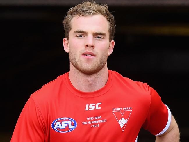 MELBOURNE, AUSTRALIA - OCTOBER 01: Tom Mitchell of the Swans walks out onto the field during the 2016 AFL Grand Final match between the Sydney Swans and the Western Bulldogs at Melbourne Cricket Ground on October 1, 2016 in Melbourne, Australia. (Photo by Quinn Rooney/Getty Images)