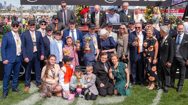 The owners of Vow And Declare shows off the spoils of victory with trainer Danny O’Brien and jockey Craig Williams. Picture: Jason Edwards
