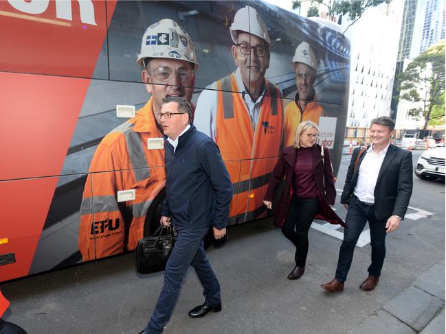 MELBOURNE, AUSTRALIA - NewsWire Photos NOVEMBER 02, 2022: Victorian Premier Daniel Andrews, Deputy Premier Jacinta Allan and Ben Carroll, Minister for Public Transport, board the media bus on the second day of the state election campaign. Picture: NCA NewsWire / Andrew Henshaw