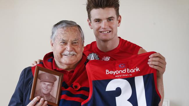 Ron Barassi and Bayley Fritsch with the revered Melbourne No. 31 jumper. Picture: David Caird