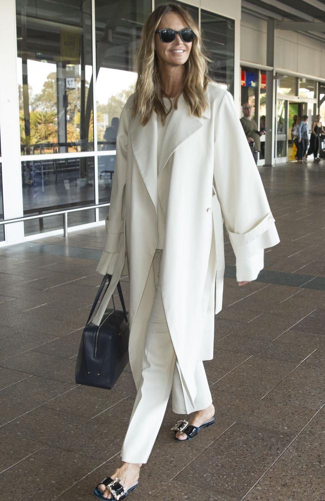 An immaculate Elle Macpherson arrives at Sydney Airport. Picture: Media Mode