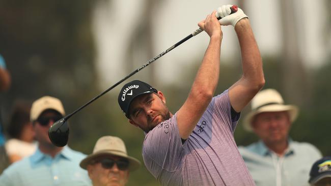 Marc Leishman tees off on Tuesday during a practice round for the Australian Open. Picture: Brett Costello